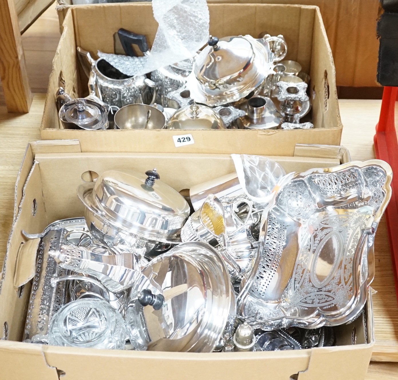 A large quantity of silver plated items including tea sets, egg cruet, goblet, cups, muffin dish and cover, napkin ring etc.